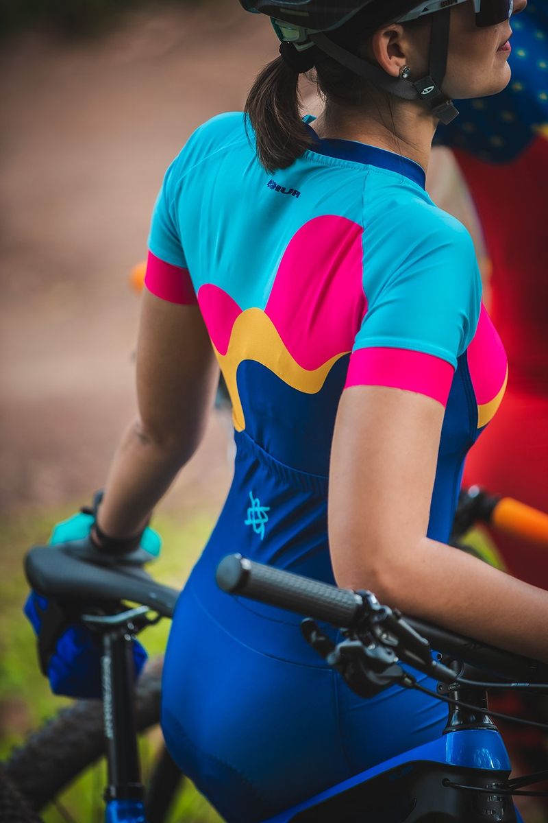 roupa-ciclismo-feminina-macaquinho-hupi-ipanema-colorido-forro-confortavel-mtb-speed